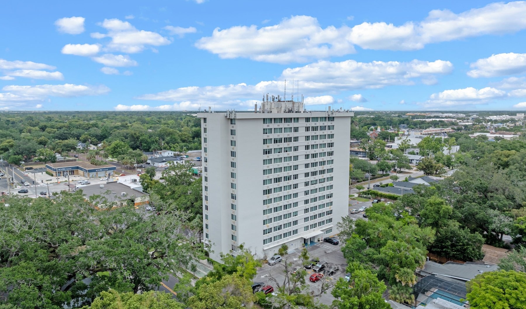 aerial view of a building with the sky in the background